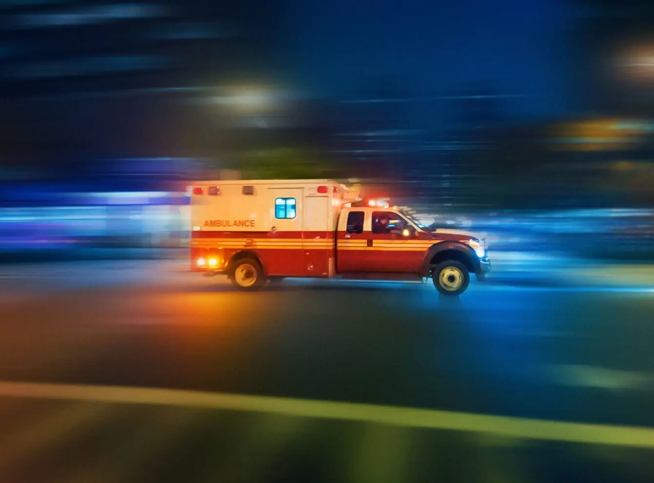 Ambulance speeding at night